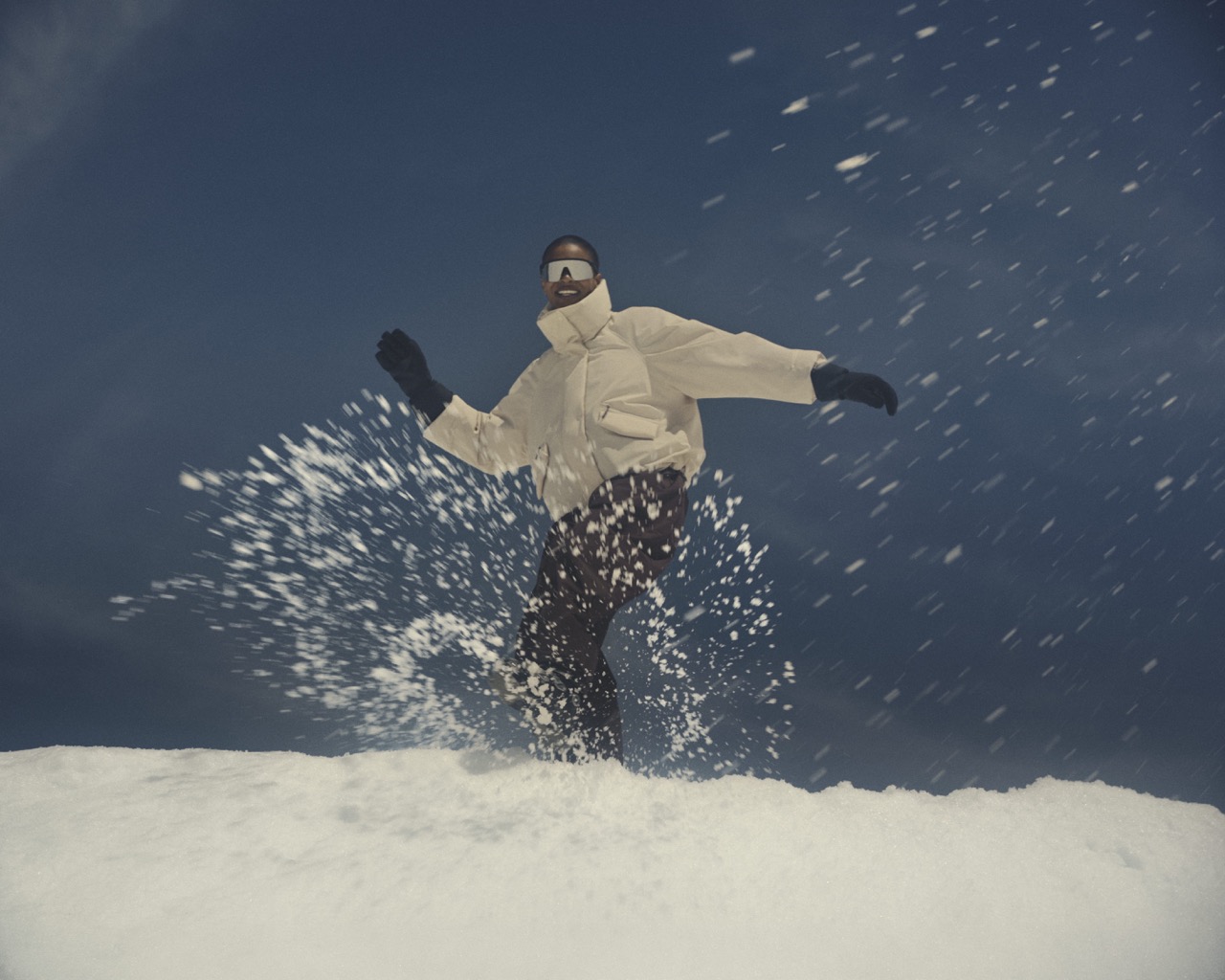 Sequence shot of a skier jumping down a snowy slope
