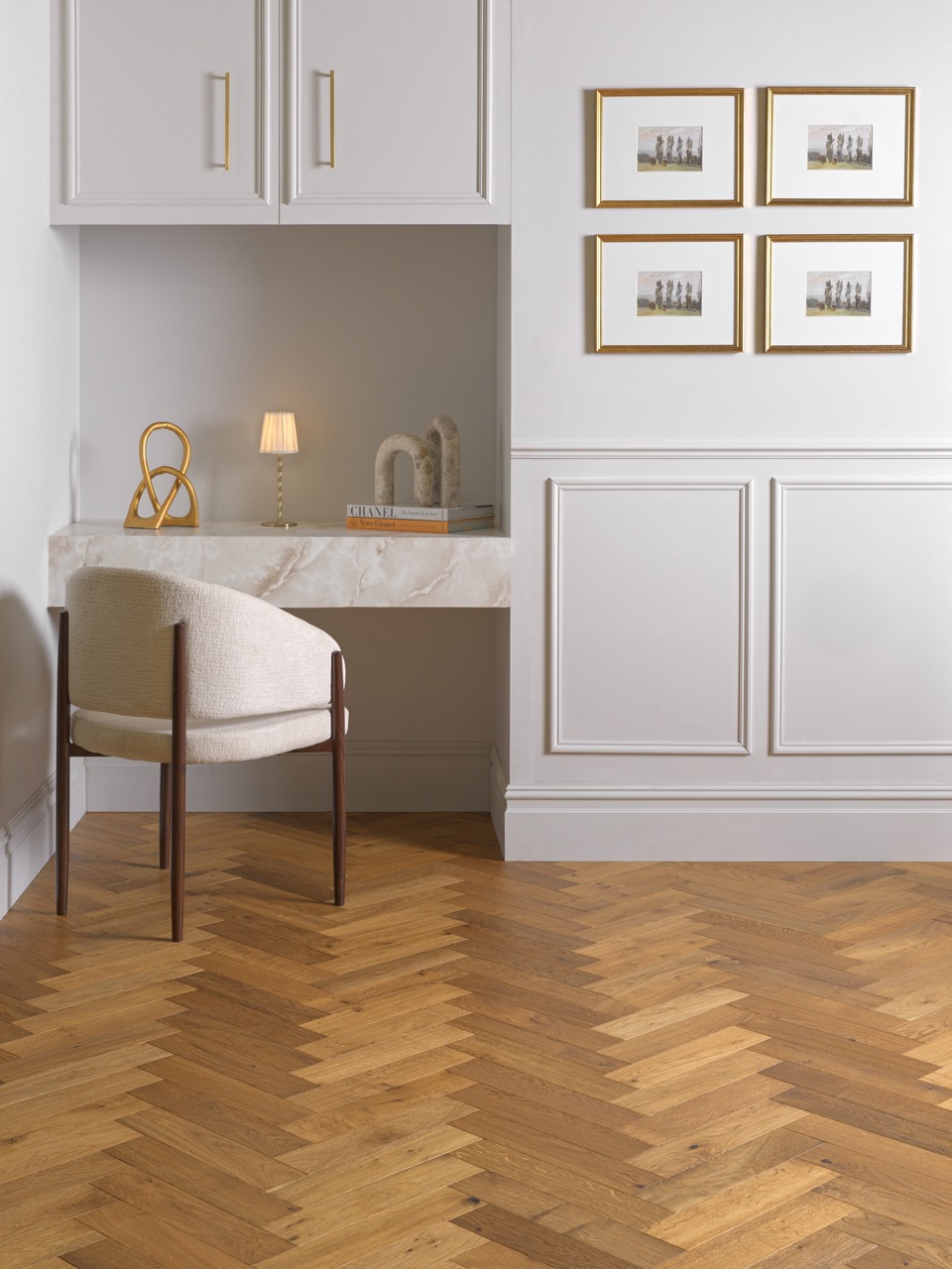 Dartmouth Gingersnap Oak hand-scraped herringbone flooring with a rich bronze patina